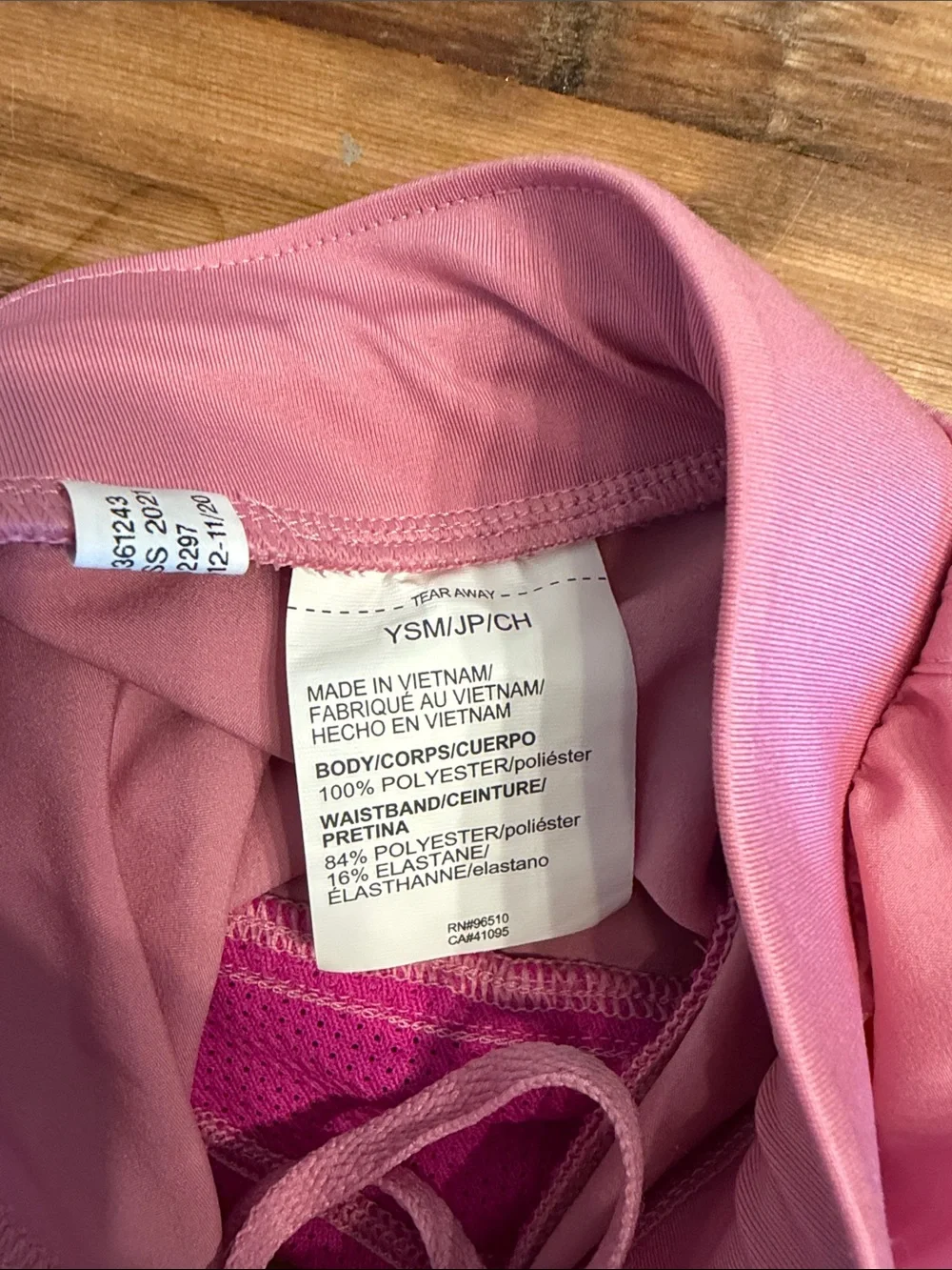 Under Armour Light Pink Girls Athletic Shorts with Hot Pink Accents